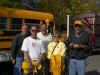 Jim, Mike and Jack Larsen with Mark and Ruthanne outside Kinnick Stadium